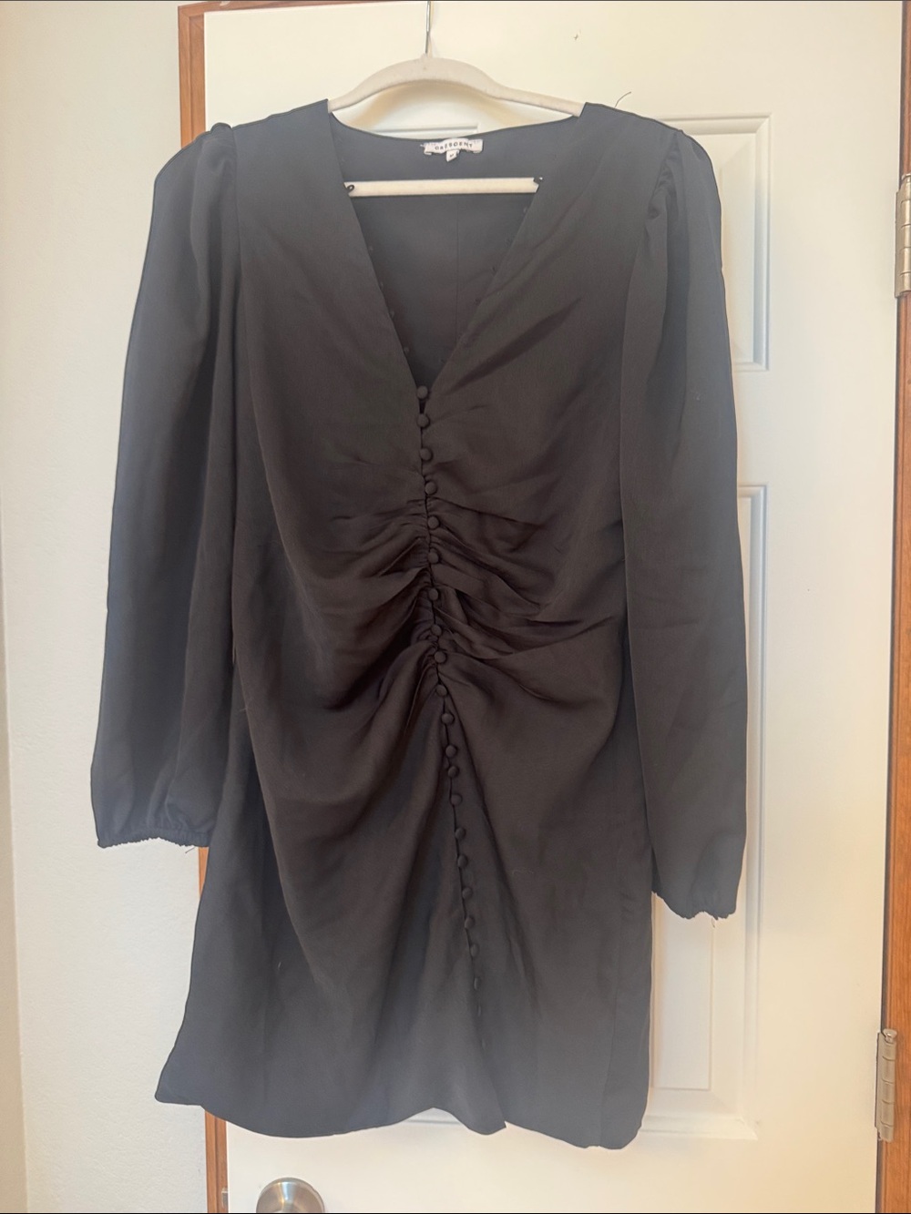 Cinched black mini dress long sleeve